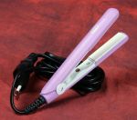 [386] 38�Premio:Mini piastra per capelli